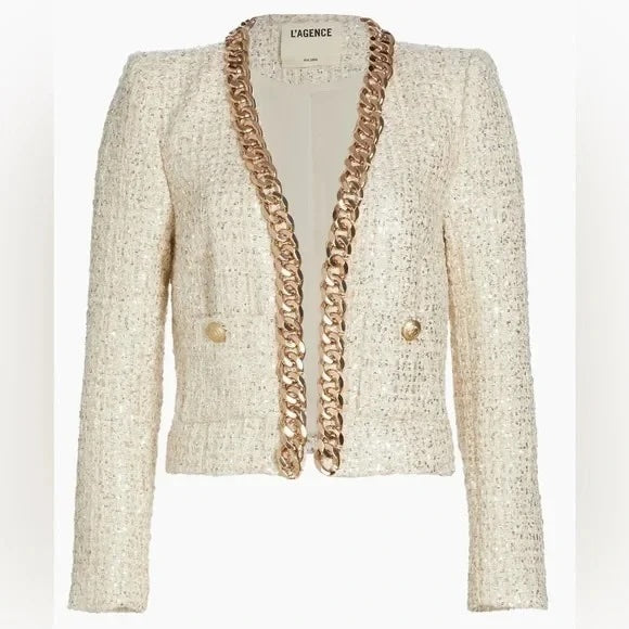 Beige blazer with gold chain details on a white background.Discounted from Original price