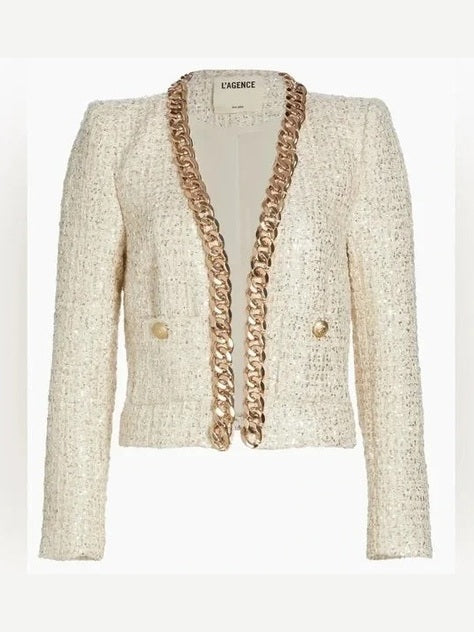 Beige blazer with gold chain details on a white background.Discounted from Original price