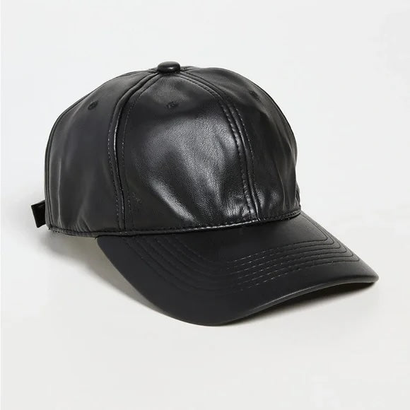 Black leather cap on a light gray background