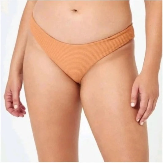 Orange bikini bottom worn by a person on a white background. Summer bikini